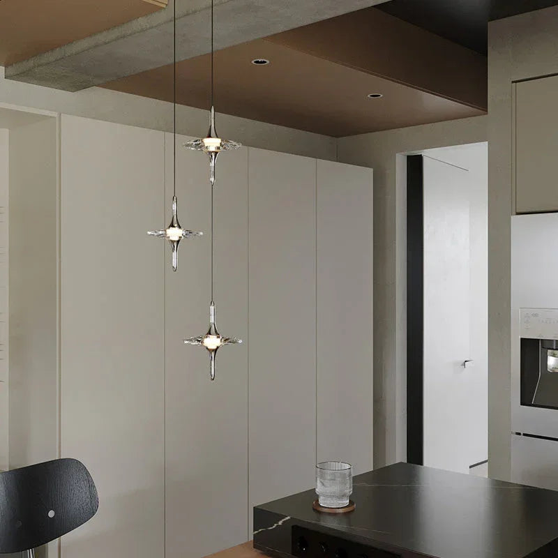 Modern crystal pendant chandelier by YH Lamps in a minimalist kitchen setting
