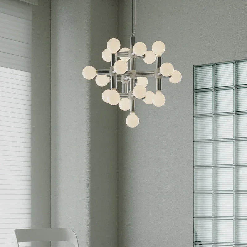 Modern silver space age chandelier with 10 globe lights by YH Lamps in a minimalist room