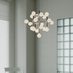 Modern silver space age chandelier with 10 globe lights by YH Lamps in a minimalist room