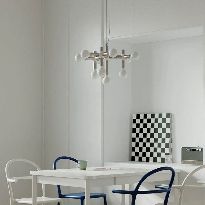 Modern silver 10-head space age pendant chandelier over white dining table, YH Lamps