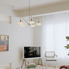 Modern silver pendant chandelier by YH Lamps illuminating a stylish living room.