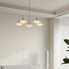 Modern silver chandelier with five lights in a minimalist living room, YH Lamps designer lighting.