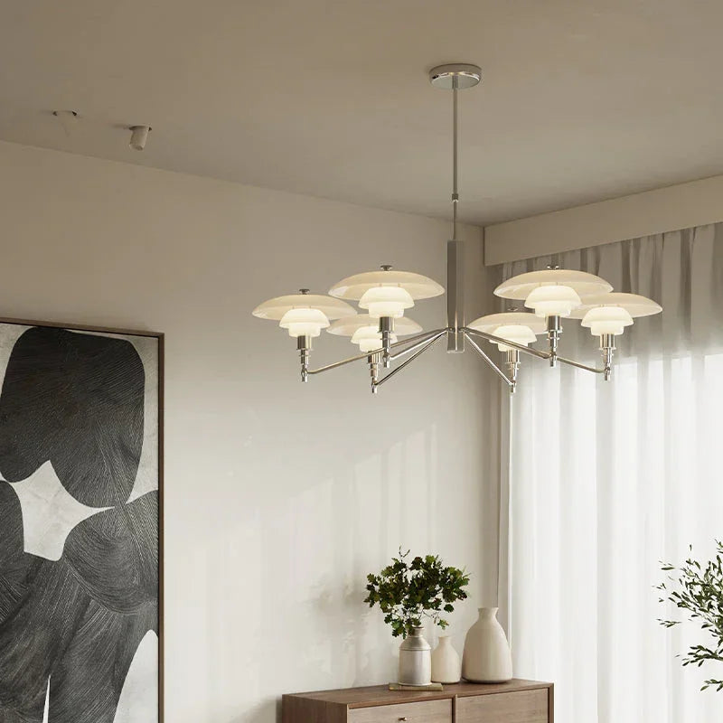 Modern silver pendant chandelier with layered glass shades in a stylish living room, YH Lamps