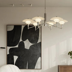 Modern silver chandelier with layered glass shades in a stylish living room at YH Lamps