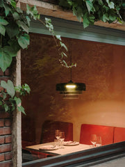 YH Lamps modern smoke grey pendant lamp over cozy restaurant table with red seating and glassware