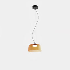 Modern smoke grey glass pendant lamp with warm light suspended by black cable and wires