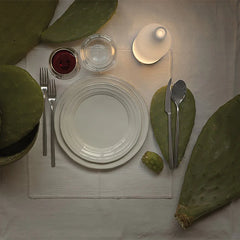 Modern white touch table lamp with warm light on dining table with plates, utensils, glass, wine, and cactus pads, YH Lamps