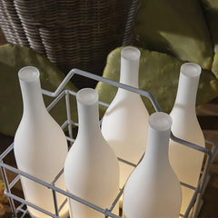 Modern white frosted bottle table lamps in a metal rack, warm light, YH Lamps