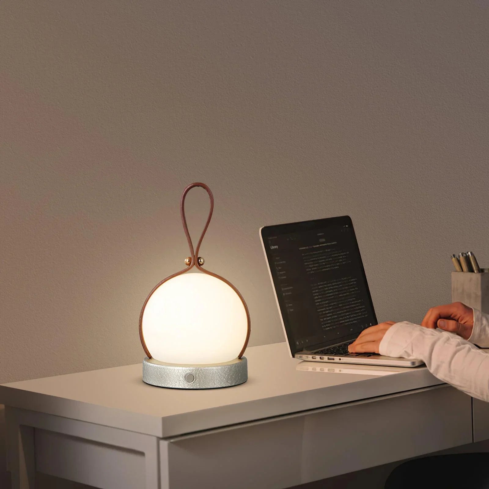 Modern YH Lamps bola lantern table lamp on desk, soft light by laptop, home office setting