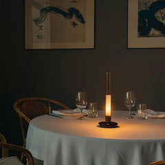 Modern black and white column table lamp with warm light on round dining table, YH Lamps