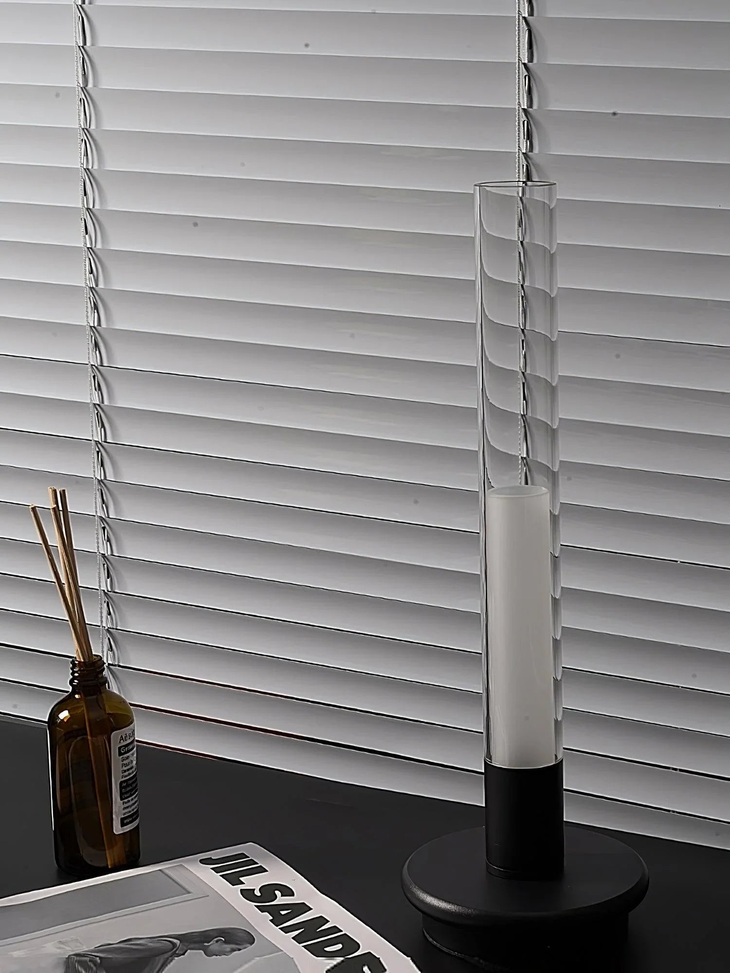 Modern black and clear column table lamp with built-in battery on desk, YH Lamps