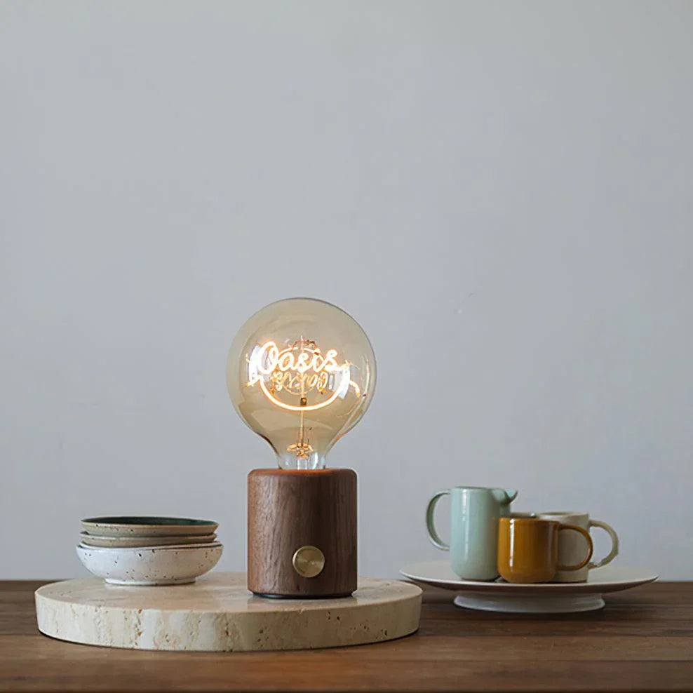 Modern YH Lamps walnut base table lamp with clear bulb, cozy dining setting in background