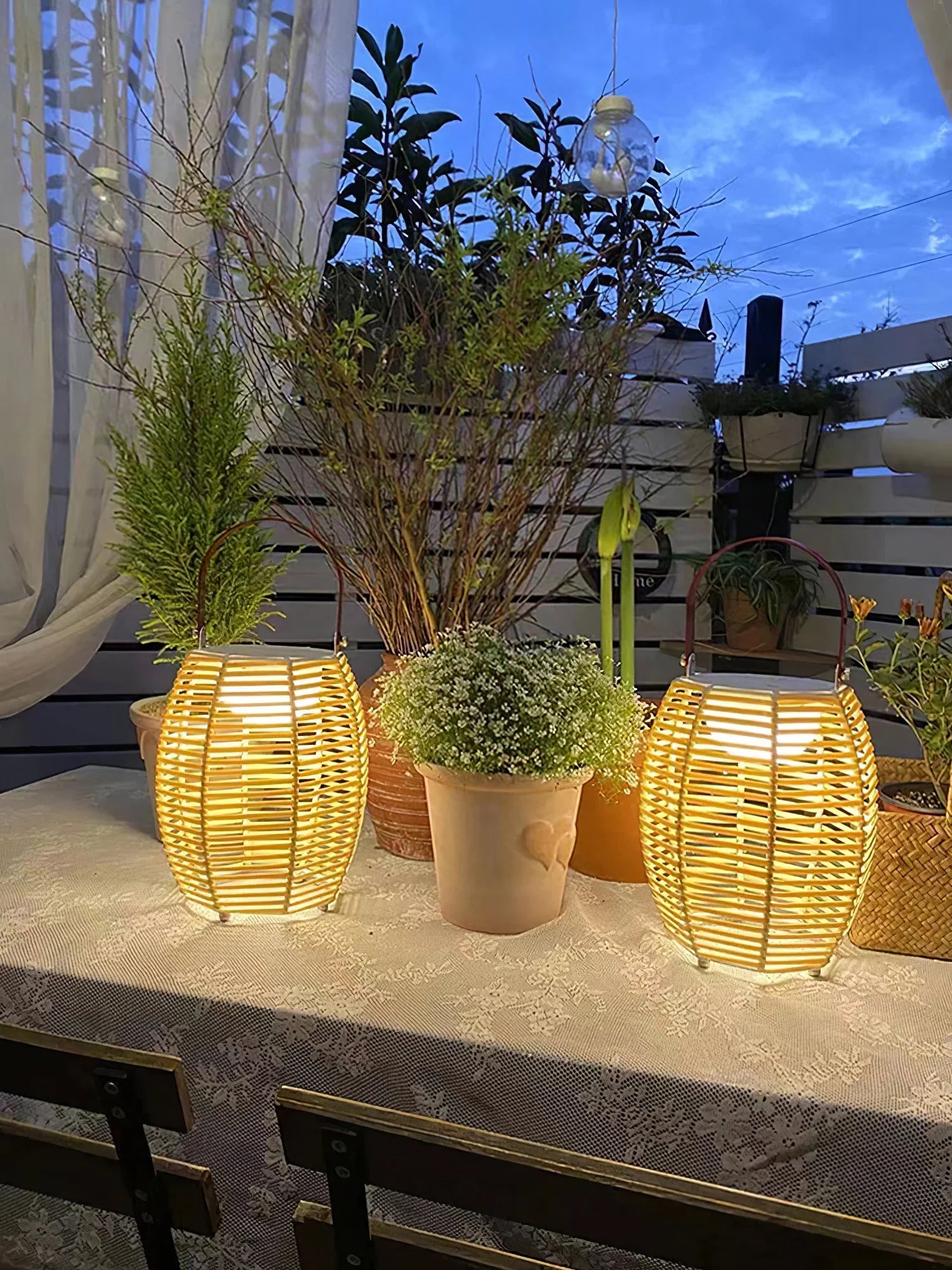 Yellow rattan USB table lamps on outdoor table with plants, modern home lighting by YH Lamps