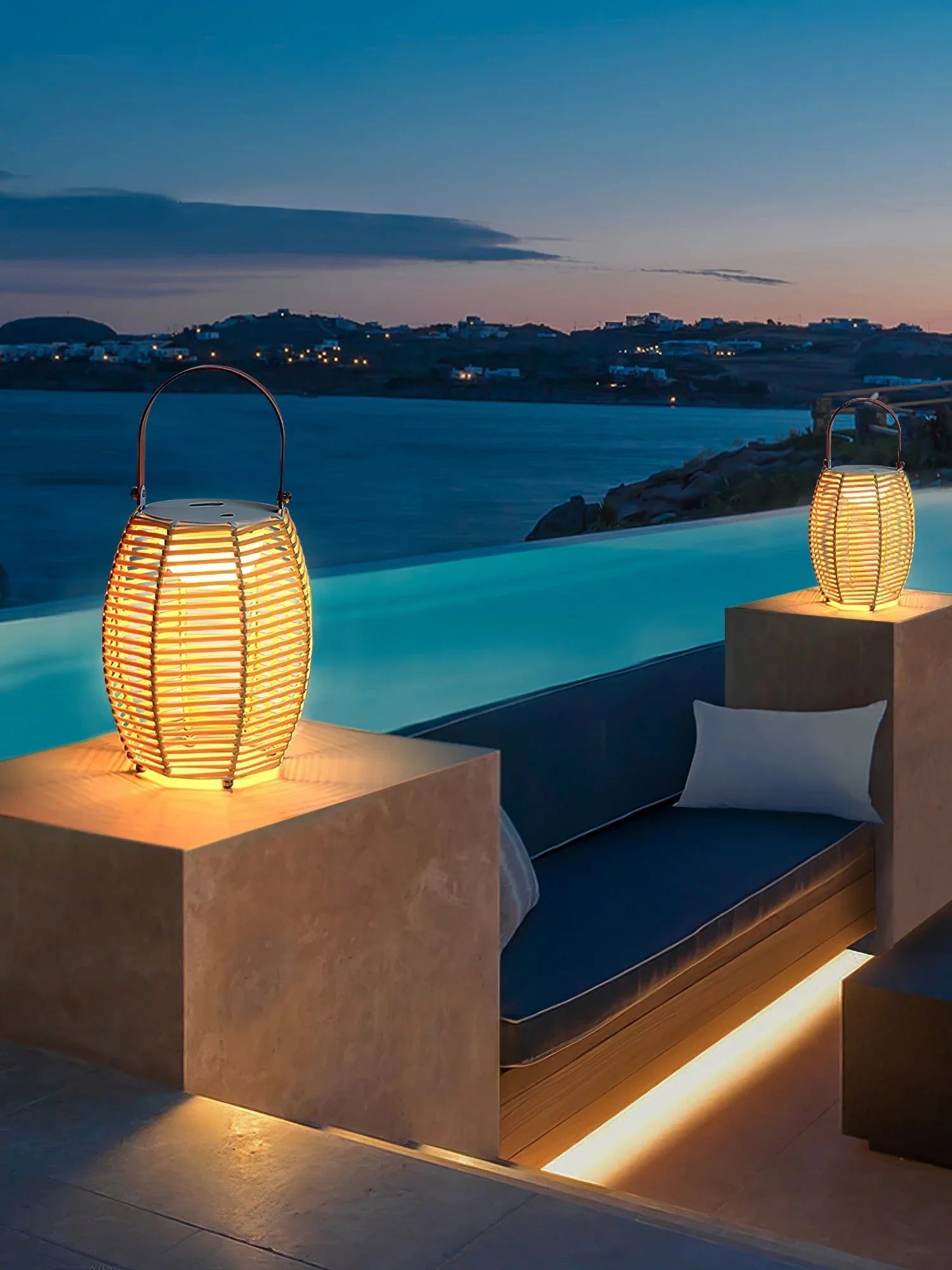 Yellow USB lantern table lamp with handle on poolside ledge at sunset, modern outdoor decor from YH Lamps