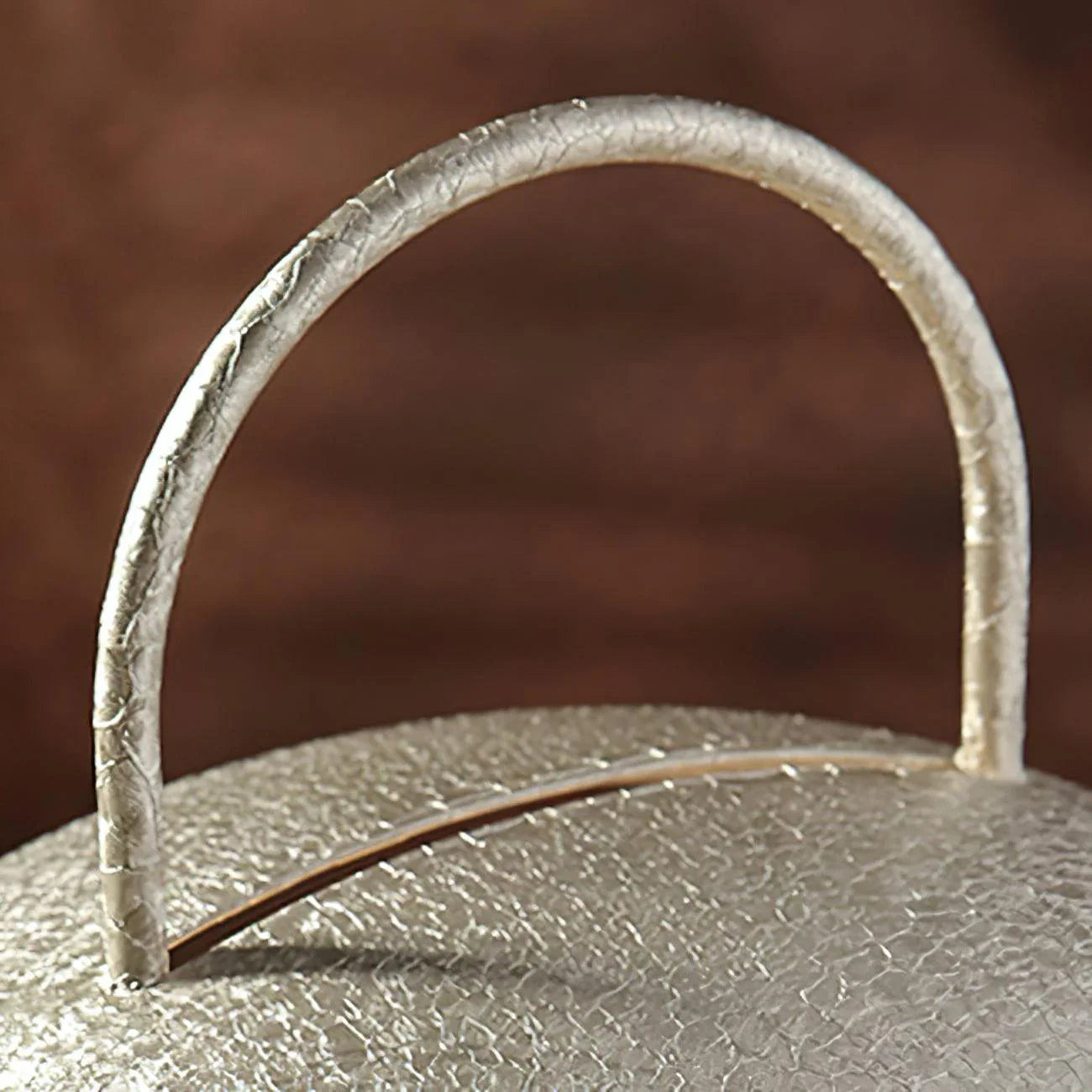 Close-up of dark gray YH Lamps portable table lamp with textured handle and dome top