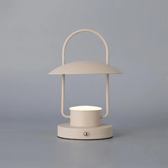 Modern beige table lamp with dome shade and round base on gray background, YH Lamps