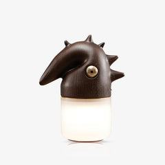 Modern table lamp with whimsical dark wood animal-shaped top and warm light, YH Lamps