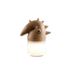 Modern wood color table lamp with animal-inspired head and warm light from YH Lamps