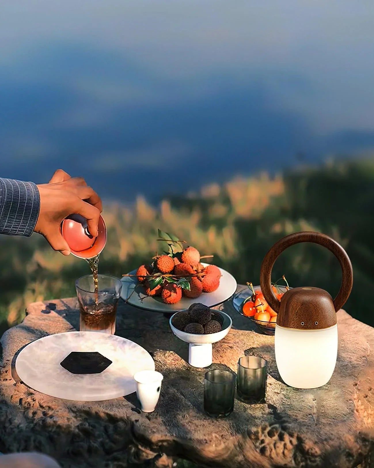 Modern wood and glass table lamp on outdoor table with fruit and drinks, YH Lamps