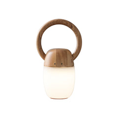 Modern wood and frosted glass Zen Buddha table lamp with warm light from YH Lamps