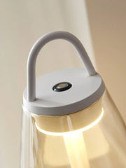 Modern YH Lamps table lamp with warm LED light, clear glass shade, and built-in handle