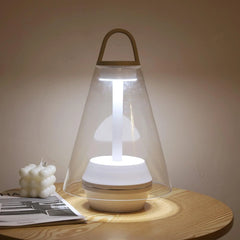 Modern YH Lamps table lamp with built-in battery on wood table, clear shade, warm light glow