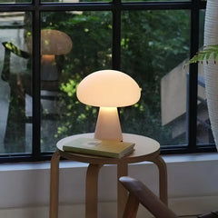 Modern white table lamp with mushroom shape on wooden side table by window, YH Lamps home decor