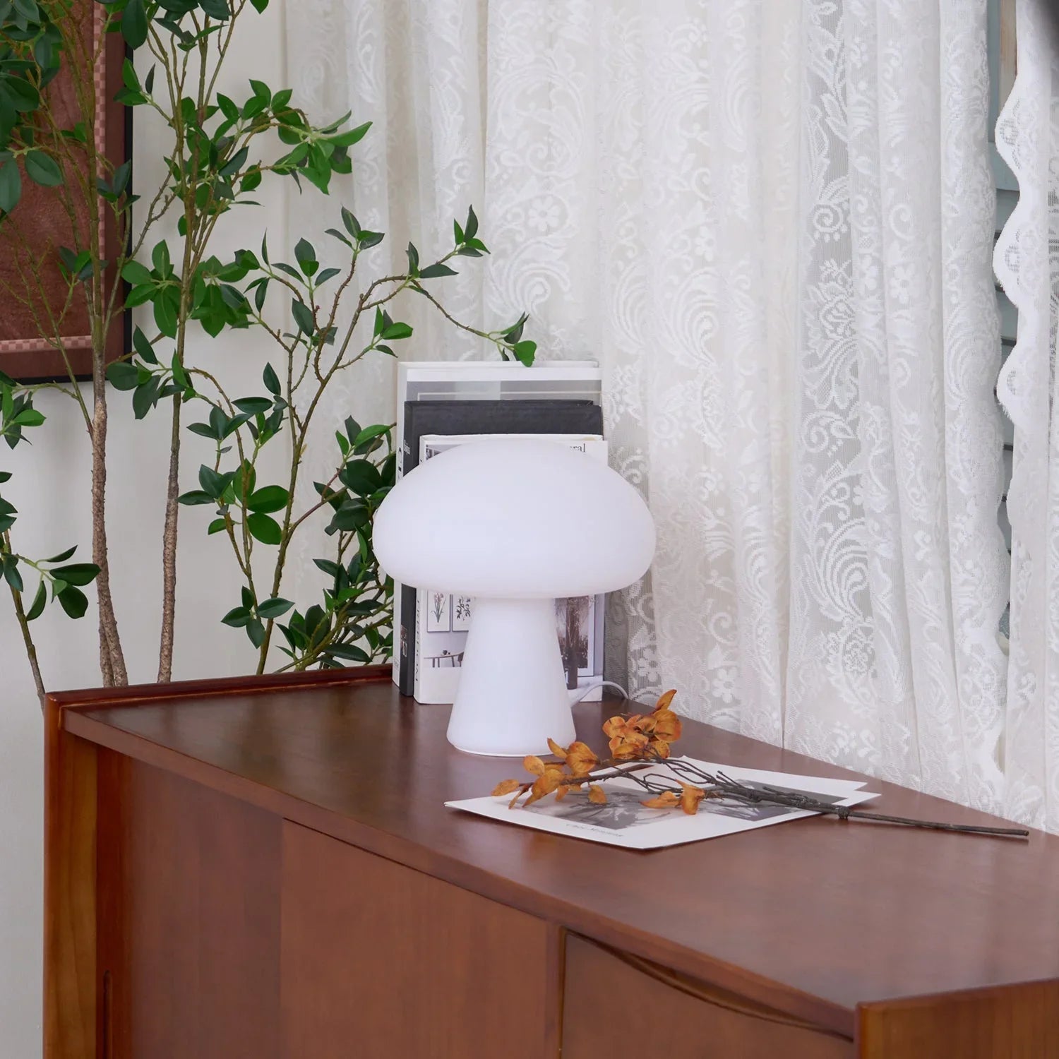 Modern white mushroom table lamp on wooden sideboard by lace curtains, YH Lamps home decor