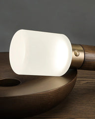 Modern wood and frosted glass table lamp with warm light from YH Lamps
