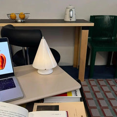 Modern white cone table lamp with touch switch on desk, YH Lamps, books and laptop nearby