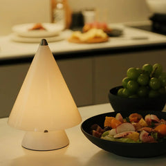 Modern white touch switch table lamp by YH Lamps on a kitchen countertop with salad and fruit bowls