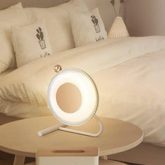 Modern round pink and dark gray table lamp with touch switch on bedside table in cozy bedroom