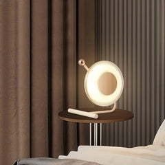 Modern round table lamp with built-in battery on bedside table in stylish bedroom, YH Lamps
