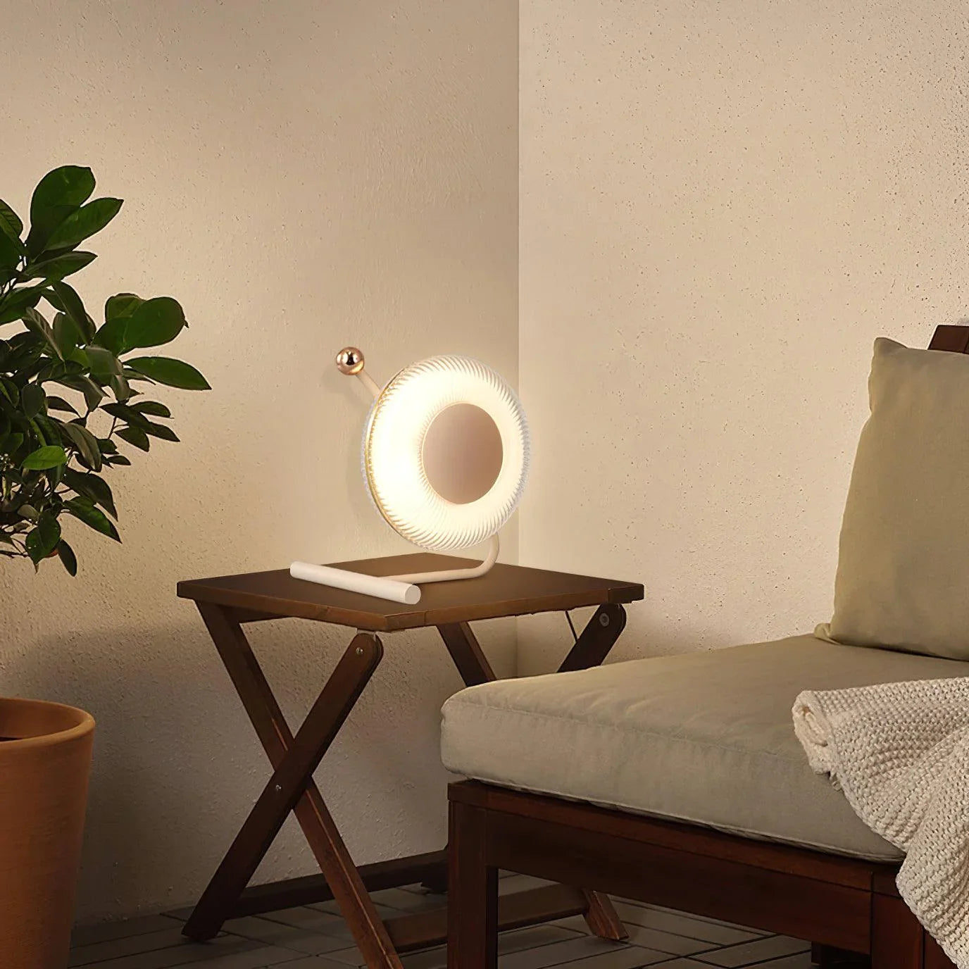 Modern round table lamp with built-in battery on wooden side table in cozy living room, YH Lamps