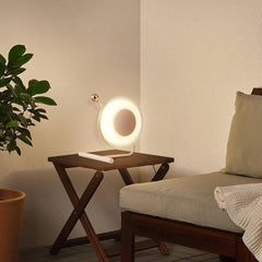Modern round table lamp with built-in battery on wooden side table in cozy living room, YH Lamps