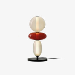 Modern YH Lamps table lamp with stacked beige and red candied glass shades on black base