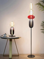 Modern YH Lamps table lamp on round marble table and matching floor lamp with colorful glass elements