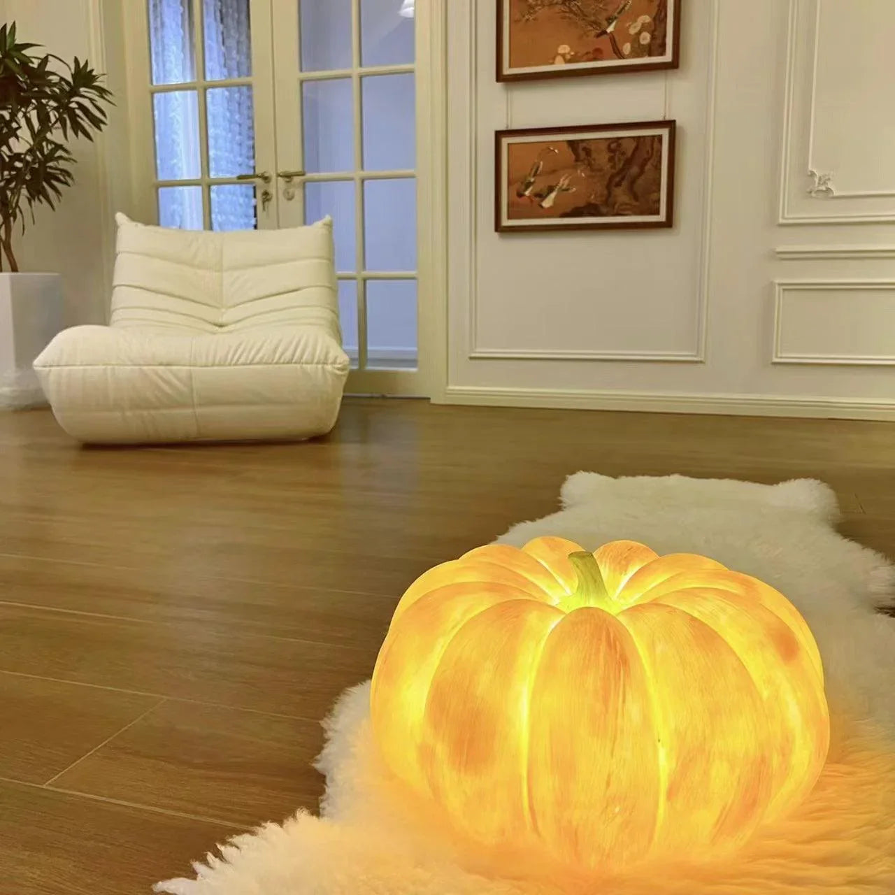 Yellow pumpkin-shaped portable table lamp on rug in modern living room, YH Lamps home decor
