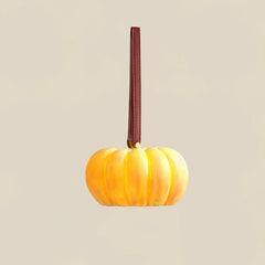 Yellow pumpkin-shaped portable table lamp with brown handle, modern lighting from YH Lamps.