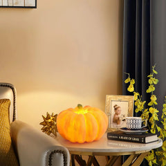 Yellow pumpkin-shaped portable table lamp with built-in battery on marble side table, YH Lamps