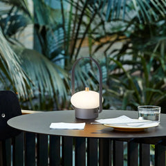 Modern dark red portable table lamp with touch switch on round table, outdoor setting, YH Lamps