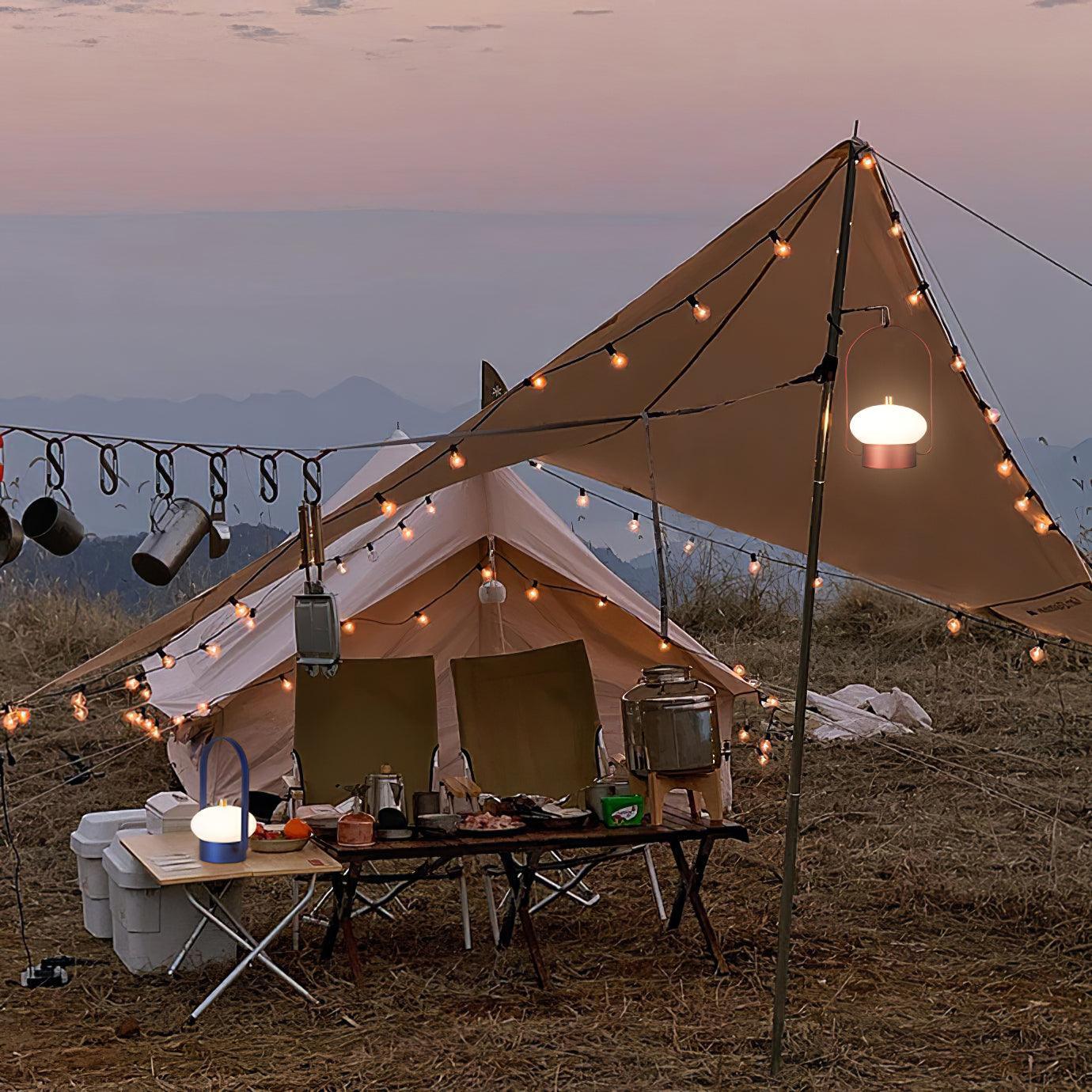 Modern dark red portable table lamp with touch switch on outdoor camping table at sunset, YH Lamps