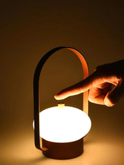 Modern dark red portable table lamp with touch switch and built-in battery, glowing softly