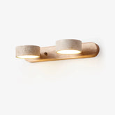 Modern 2-light walnut and travertine wall lamp emitting warm light, minimalist design