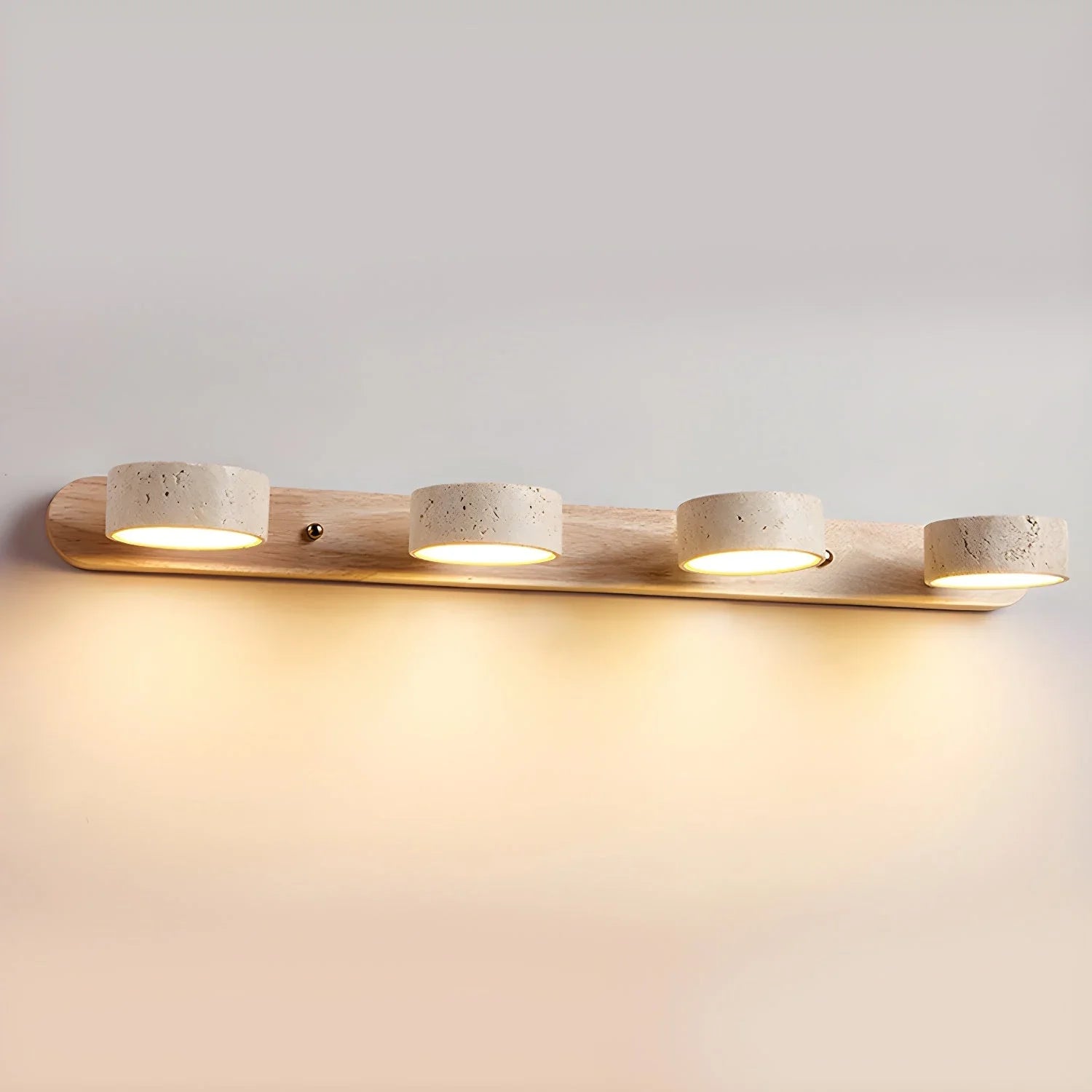 Modern 4-light wall lamp with walnut wood base and warm travertine shades illuminating soft yellow light