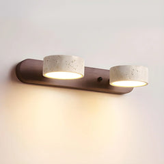 Modern wall sconce with two warm light travertine lampshades on walnut wooden base