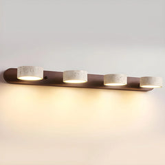Modern four-light wall lamp with walnut finish and travertine shades emitting warm light