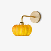 Yellow gold pumpkin-shaped wall lamp with round wooden mount, modern sconce by YH Lamps