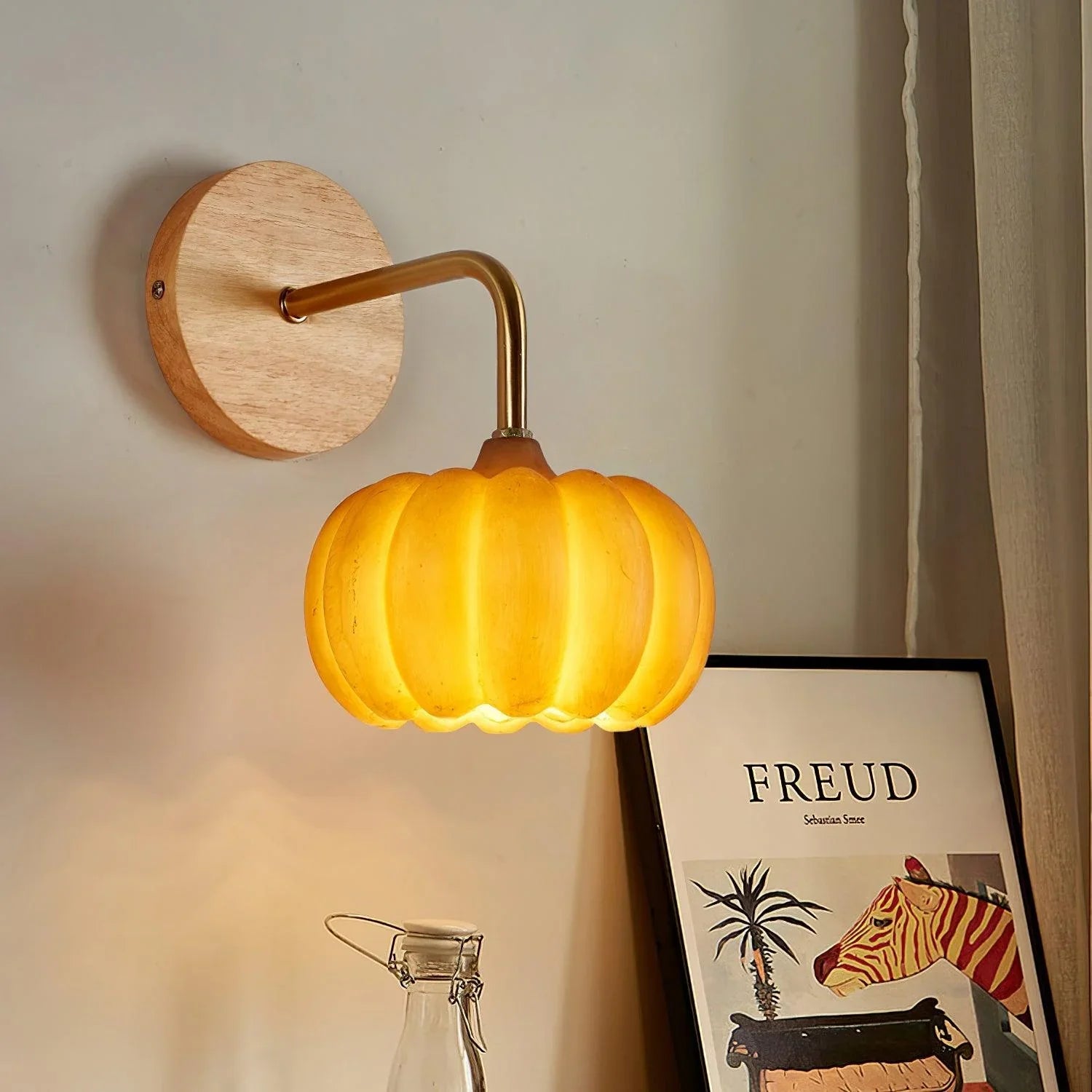 Modern yellow gold pumpkin wall lamp with wood mount, warm lighting, YH Lamps