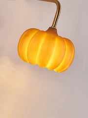 Yellow gold pumpkin-shaped wall lamp with brass fixture, modern lighting by YH Lamps